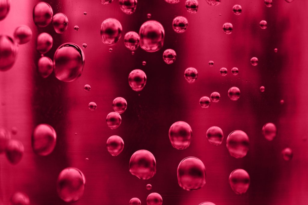 Red liquid with bubbles